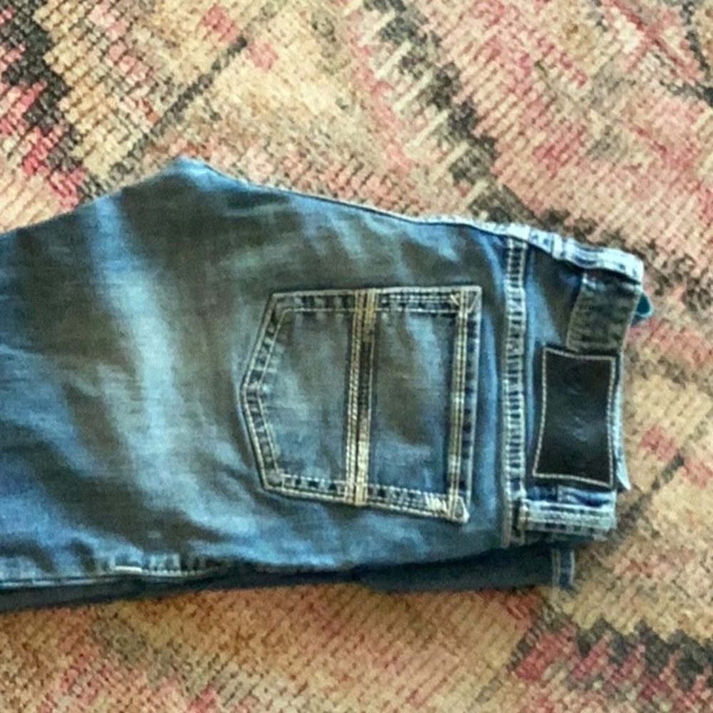Men’s 31 waist by 38 length. Good condition.